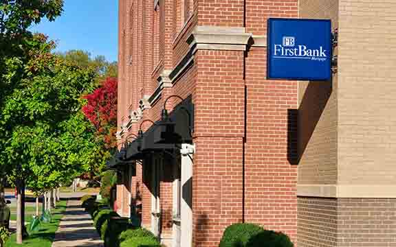 FirstBank Mortgage sign on exterior of building