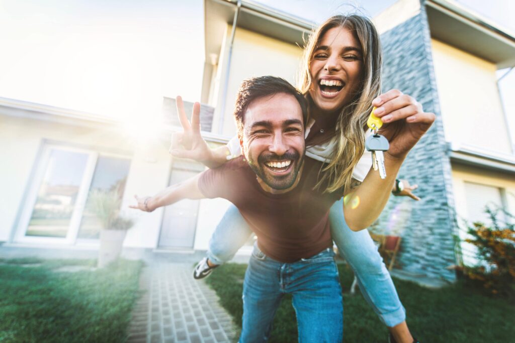 Couple holding house keys