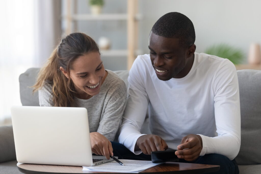 Couple looking at computer together
